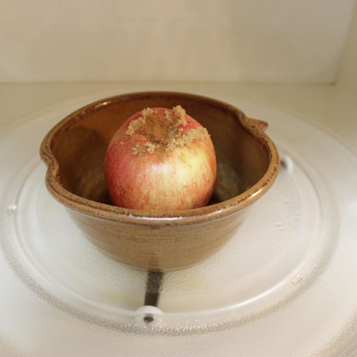 Handmade Pottery Apple Baker and apple in microwave