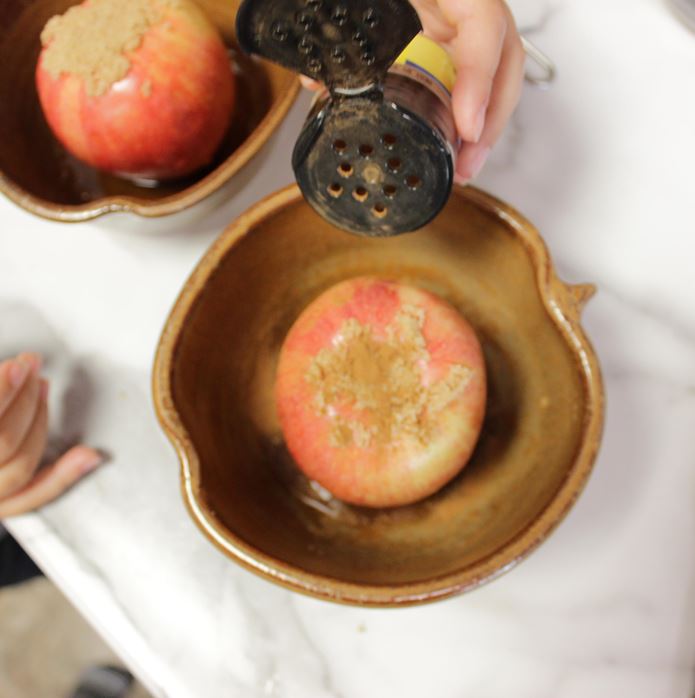 Handmade Pottery Apple Baker with apple and cinnamon