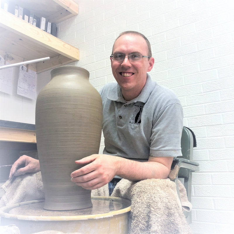 Tyler Sandstrom making a large vase on the potter's wheel  From Miry Clay Pottery Dayton Iowa Iowa Pottery